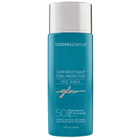 Blue bottle of Spf with a sliver cap