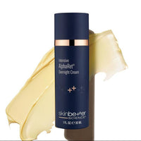 Blue skincare bottle with cream smear on white background