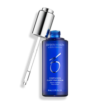 Blue serum bottle with dropper on a white background