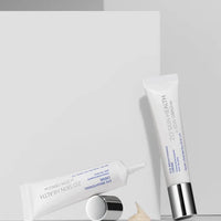 Two skincare products on a light gray background