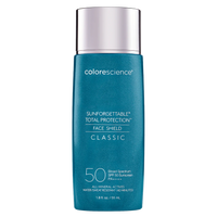 Blue bottle of SPF with silver cap