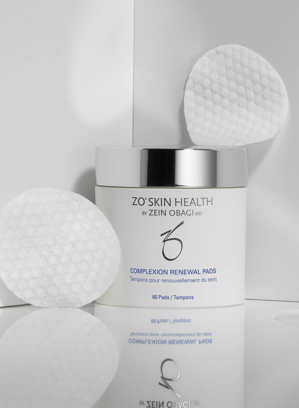 ZO Skin Health product with pads on a light gray background