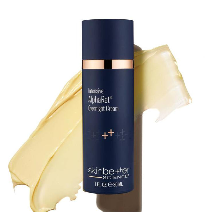 Blue skincare bottle with cream smear on white background