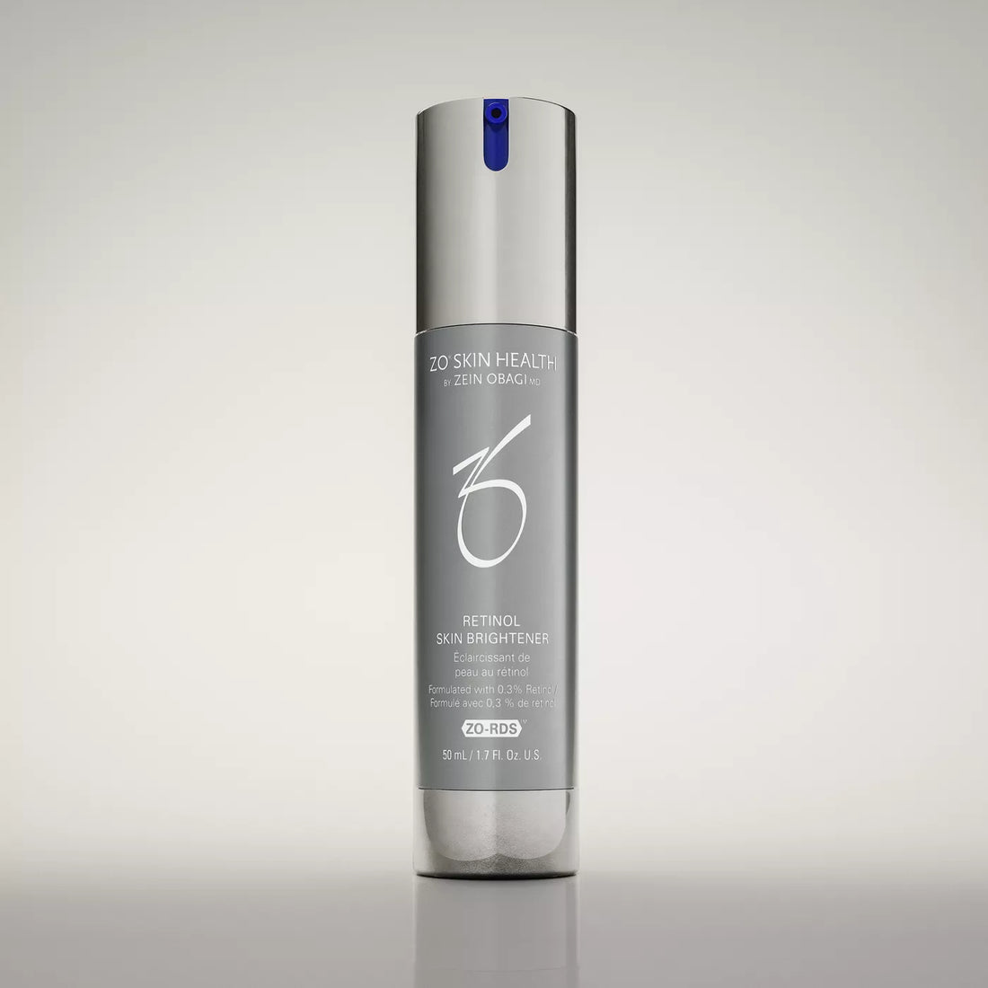 A single cylindrical skincare bottle labeled 'ZO' Skin Health by Zein Organics Retinol Skin Brightener' in silver and gray packaging, photographed against a clean light gray studio background.