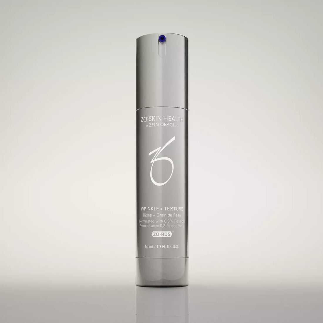 ZO Skin Health Wrinkle & Texture Intensive Treatment in a sleek, metallic silver cylindrical bottle with a white logo and text, set against a clean, light gray gradient background.