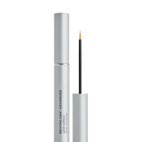 silver bottle of lash serum