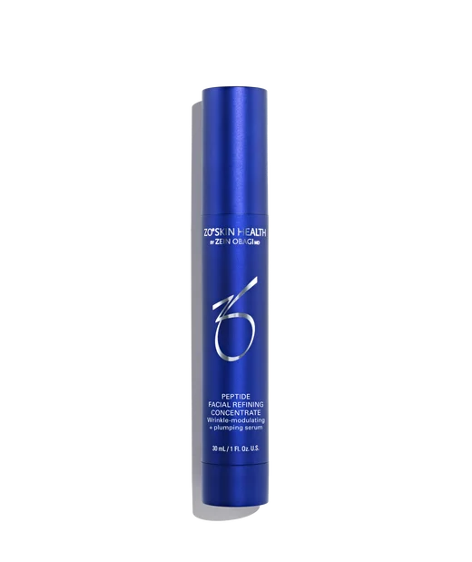 Blue skincare serum bottle with brand logo on a white background