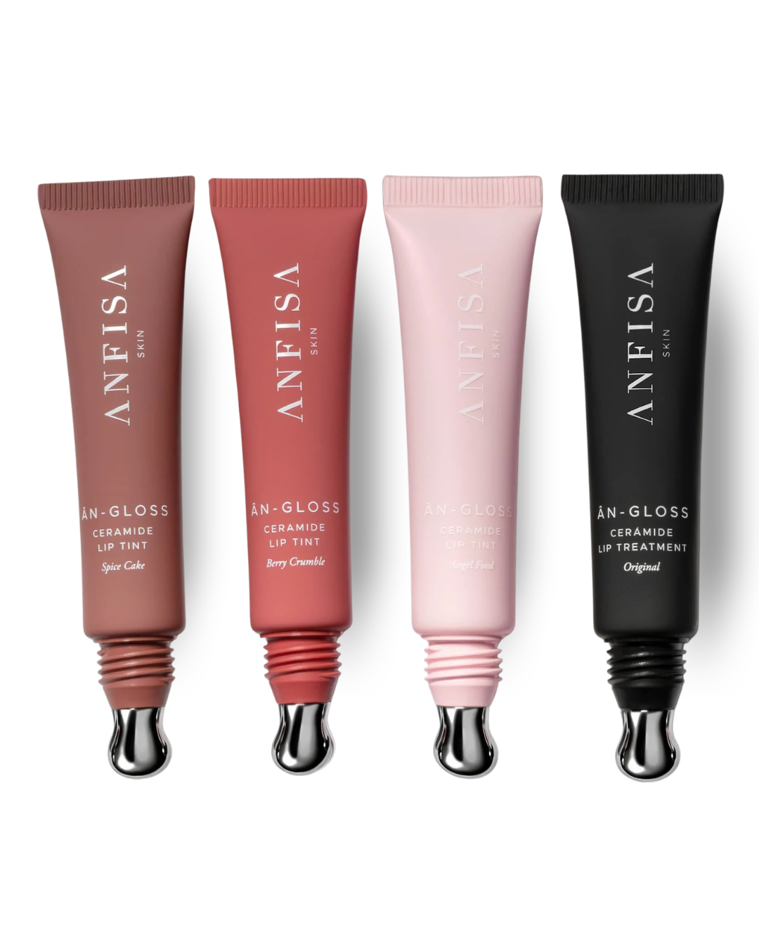 Four Anfisa Skin lip treatment tubes in a row on a white background: two matte lip tint tubes in warm brown and dusty rose, one matte lip treatment tube in pale pink, and one black lip treatment tube.