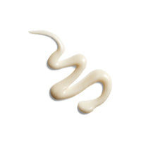 Swoosh of white cream on a white background